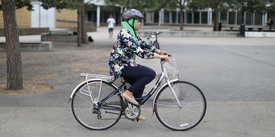 Person on a cycle in a cycle skills session