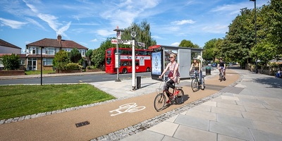 People cycling along cycleway