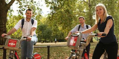 Three people riding Santander bikes
