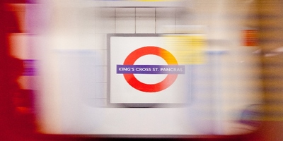 Kings Cross station roundel seen from a moving tube carriage