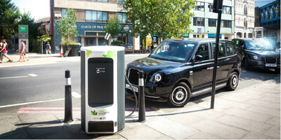Electric taxi parked using a rapid charge point