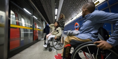 Wheelchair users at a station