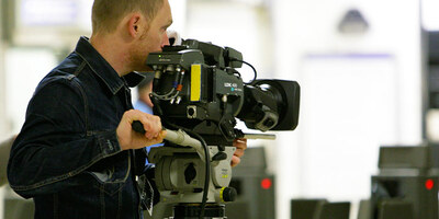 A production crew film on the Tube